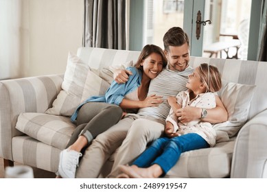 Parents, girl and happy on sofa with hug, conversation or funny story for bonding, care and love in lounge. Father, mother and daughter with embrace, laugh and memory with connection in family home - Powered by Shutterstock