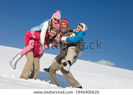 Similar – Image, Stock Photo Sisters enjoying piggyback ride