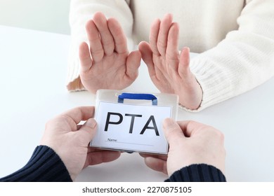 Parent's hand refusing for getting PTA name plate