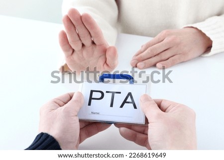 Parent's hand refusing for getting PTA name plate