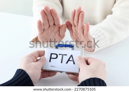 Parent's hand refusing for getting PTA name plate
