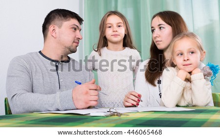 parents having quarrel adout documents in front of children indoor Stock photo © 