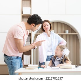 Parents Helping Their Daughter With Lessons And Homework. Mother Protecting Her Child From Angry Father Who Is Going To Hit Her. Punishment And Education Concept