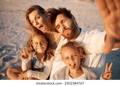 Parents, kids and selfie at beach, funny face or smile with care, love or tongue out for memory in summer. Father, mother and daughter children with peace sign, family or portrait on holiday in Spain - Powered by Shutterstock