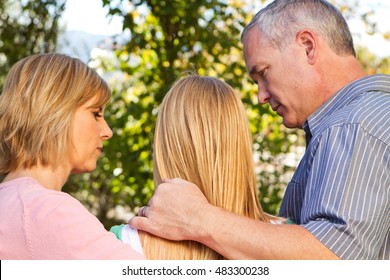 Parents Talking With Their Teenage Daughter.