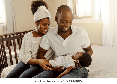 Parents together holding a new born. Family concept. - Shutterstock ID 2271146885