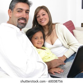 Parents whit son look in notebook on white background - Shutterstock ID 60038756