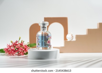 parfum bottle on podium with tropical leaf shadow,stylish background for product presentation,beauty concept - Shutterstock ID 2145438613
