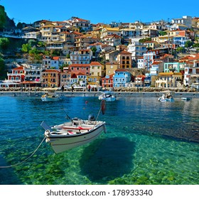 Parga boat - heaven on earth -  Greece holidays - clear sea and reflaction - Powered by Shutterstock