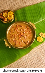 Parippu Payasam Pradhaman or Moong Dal Kheer Indian sweet Kerala food for Onam festival special dessert Mithai for Onam sadya , sadhya in green banana leaf background. Also popular Sri Lankan food .