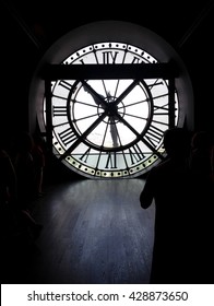 PARIS - 26 JUNE 2015:  Silhouette Of Tourists Looking At The Clock Tower In The Musee D'Orsay In Paris, France,  Adaptive Reuse Project Train Station Turned Art Museum.