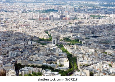 Paris From Above, Seen From The Eiffel Tour. In The Center Is The Arc De Triomphe As Figurative Centerpoint Between Two Patches Of Clouds. The Lush, Tree-lined Avenues, Are Clearly Visible