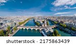 Paris aerial panorama with river Seine, Pont Neuf bridge, ile de la cite and Notre-Dame church, France. Holidays vacation destination. Panoramic view above historical Parisian buildings and landmarks.