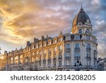 Paris, ancient facade boulevard Hausmann, with a beautiful dome