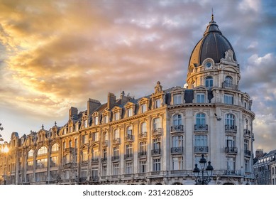 Paris, ancient facade boulevard Hausmann, with a beautiful dome