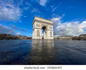 Paris, arc de triomphe during a sunny and cloudy day - Shutterstock ID 1933031957