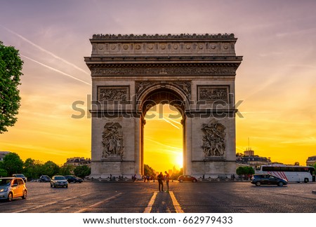 Paris Arc de Triomphe (Triumphal Arch) in Chaps Elysees at sunset, Paris, France. Architecture and landmarks of Paris. Postcard of Paris