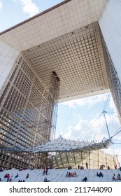 PARIS - AUGUST 05: Grande Arche in La Defense with unidentified people on August 05, 2014 in Paris. Its Europes largest business district with 560 ha area, 72 glass and steel buildings and skyscrapers