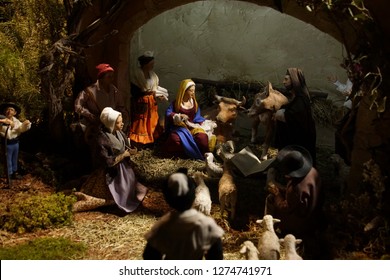 PARIS - DEC 7, 2018 - Village Scenes In The Christmas Creche Of The Nativity In The Nave Of Cathedral Of Notre Dame, Paris, France