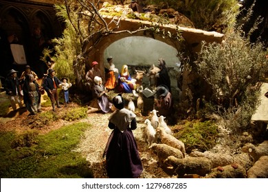 PARIS - DEC 7, 2018 - Village Scenes In The Christmas Creche Of The Nativity In The Nave Of Cathedral Of Notre Dame, Paris, France