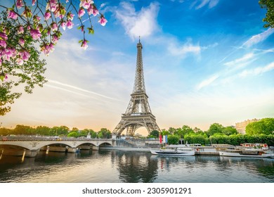 Paris Eiffel Tower and river Seine with sunrise in Paris, France. Eiffel Tower is one of the most iconic landmarks of Paris, web banner format