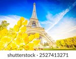 Paris Eiffel Tower summer flowers in Paris, France. Eiffel Tower is one of the most iconic landmarks of Paris at fall