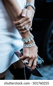 Paris Fashion Week Street Style Before Louis Vuitton Fashion Show Spring/Summer 2017 Woman Hands Full Of Diamonds Holding Bag And Phone