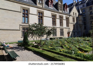 Paris, France 07 03 2022 , Hotel De Sens Garden , Beautiful Lawn Bushes And Flowers