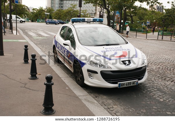 Paris / France 08 24 2010: French National\
Police cruiser car parked at the\
curb