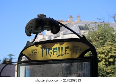 Paris, France - 08.07.2022: The Famous Paris Metro Sign Designed By Hector Guimard