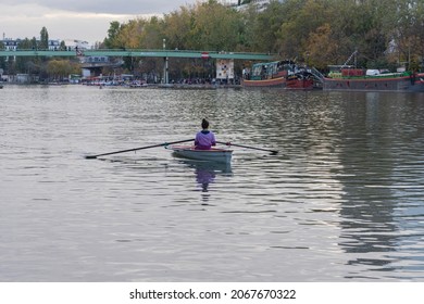 Paris, France - 10 23 2021: Woman Rower On The Ourcq Canal