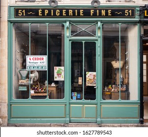 Paris, France 10-09-18. Old, Vintage Paris épicerie, Grocery Store Shop Front Facade In The Marais With Light Green Wood Trim Around The Windows And Door