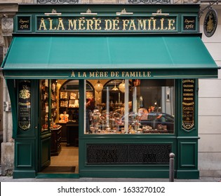 Paris, France 10-11-18.  Classic vintage Paris candy store front À la Mère de Famille with Dark Green facade and awining with appetizing samples in window