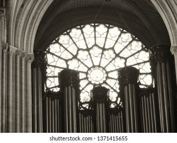 Paris, France. 12/04/2007. Notre Dame Cathedral. Interior Of The Cathedral Then Destroyed By The Fire Of 04/15/2019. Organ And Glass Window Above.