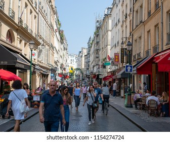 Paris France, 14 July 2018: Rue Montorgueil Pedestrian Street View In Paris France During Summer With Tourists And Parisian People