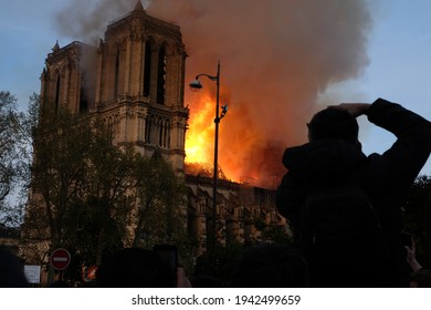PARIS, FRANCE - 15 April 2019: The Notre Dame Cathedral on fire in a tragical day 
