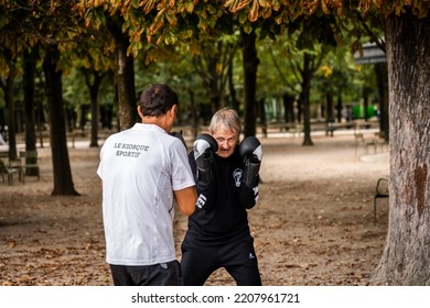 Paris, France, 15 September 2022: Senior Man Performs Boxing Training In The Park