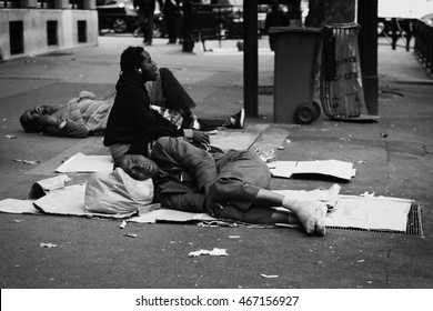 Paris, France - 17 September, 2015: Men Sleeping On The Street In Paris. Homelessness In EU Reached 3 Million People In 2004. Globally About 100 Million People Live On The Street. Black And White.