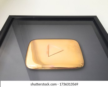 PARIS / FRANCE - 18 MAY 2020: Gold YouTube Play Button Creator Award For 1 Million Subscribers