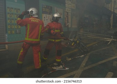 Paris, France.  1st May 2022.Firefighters Try To Extinguish A Fire That Broke Out During  A Protest On May Day Labour Union March.