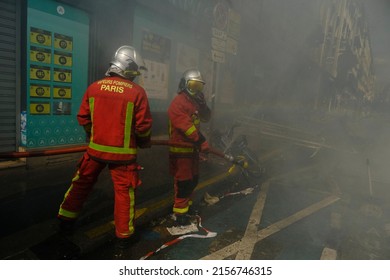 Paris, France.  1st May 2022.Firefighters Try To Extinguish A Fire That Broke Out During  A Protest On May Day Labour Union March.