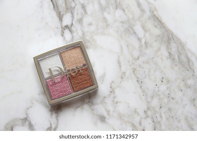 PARIS, FRANCE - 20 JUNE 2018: A Pallet Of Dior Backstage Glow Face Highlight & Blush. Dior Is A European Luxury Goods Company With Revenues Of $41.6 Billion And Almost 85,000 Employees. Editorial.