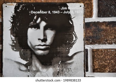 Paris, France, 2021 06 12- Metal Poster Of Jim Morrison On A Brown Brick Wall -  Sixties Rock Star -