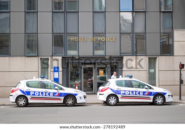 Paris, France, 22\
June: Police Department with two police cars on the Rue de\
Vaugirard June 22, 2012 in\
Paris.