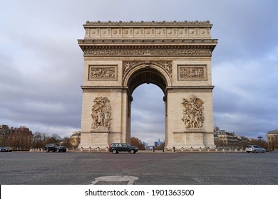 PARIS, FRANCE -25 DEC 2020- View of the Arc de Triomphe, a landmark monument on Place de l'Etoile and the Champs-Elysees in Paris, France.