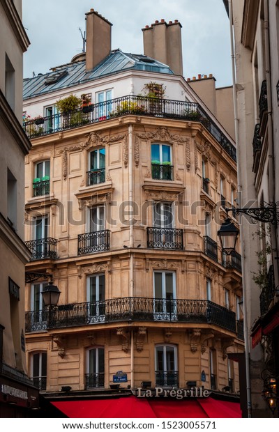 PARIS,\
FRANCE - 28 SEPTEMBER 2019: Streets and architecture of the Paris.\
A lot of people visit and enjoy Paris each\
year.
