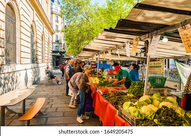 Paris, France - Apr 20, 2019 - Traditional Food Market In Paris During Sunny Morning