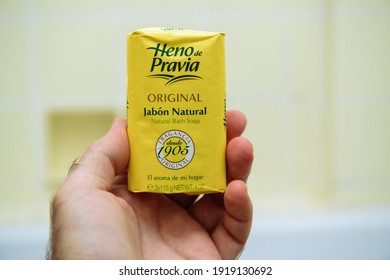 Paris, France - Apr 8, 2020: POV Male Hand Holding New Package Of Heno De Pravia Original Spanish Sopa Jabon Natural Natural Bath Soap