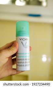 Paris, France - Apr 8, 2020: POV Personal Perspective Male Hand Holding Bottle With Vichy Deodorant Antiperspirant