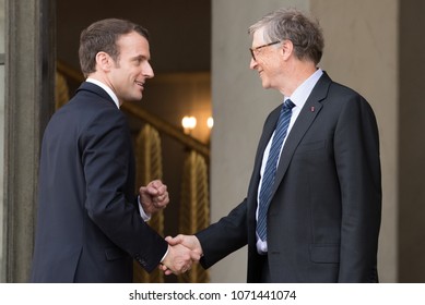 PARIS, FRANCE - APRIL 16, 2018 : The french President Emmanuel Macron welcoming Bill Gates at the Elysee Palace to speak about Bill & Melinda Gates Foundation (BMGF).